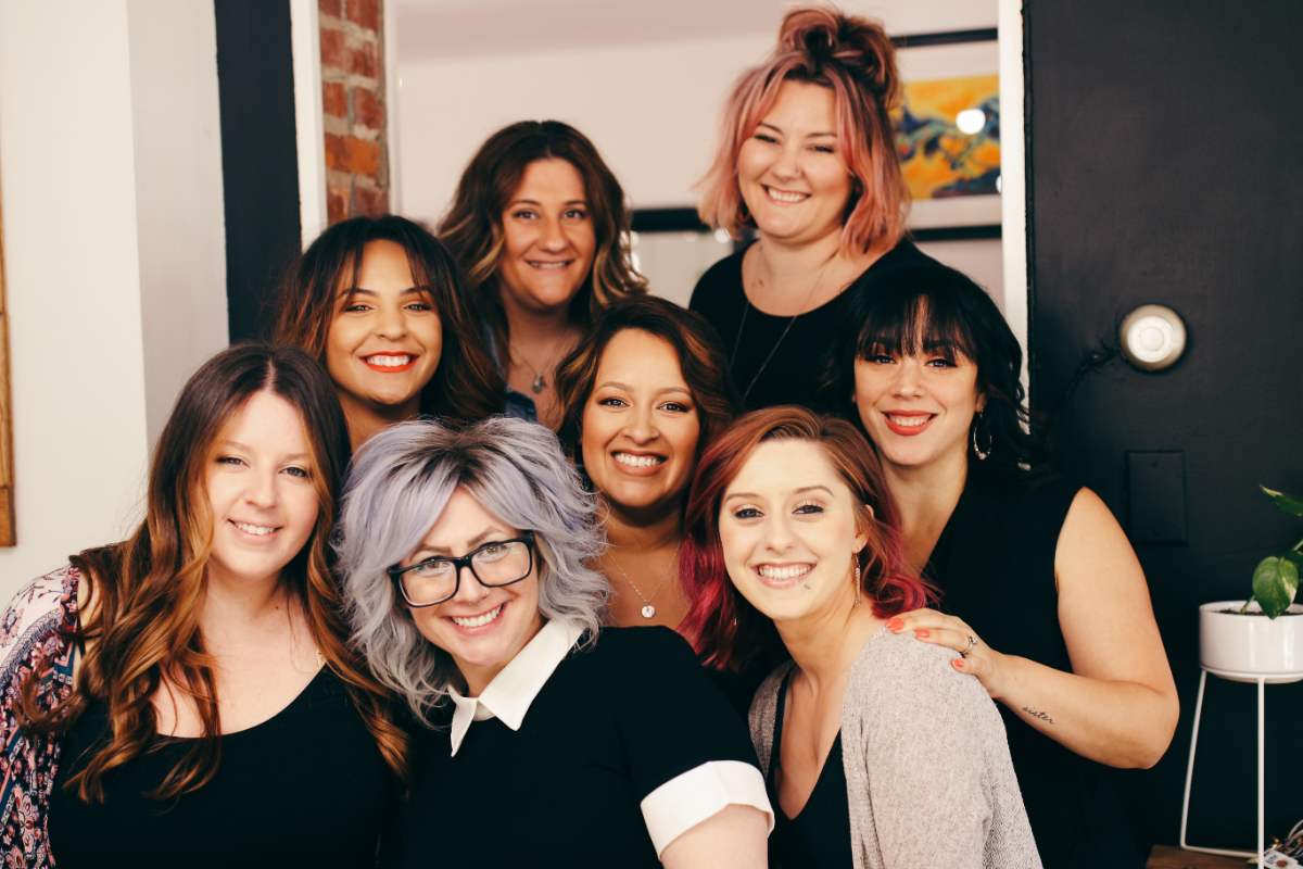 Image of Shag salon group of friends getting hair styled laughing